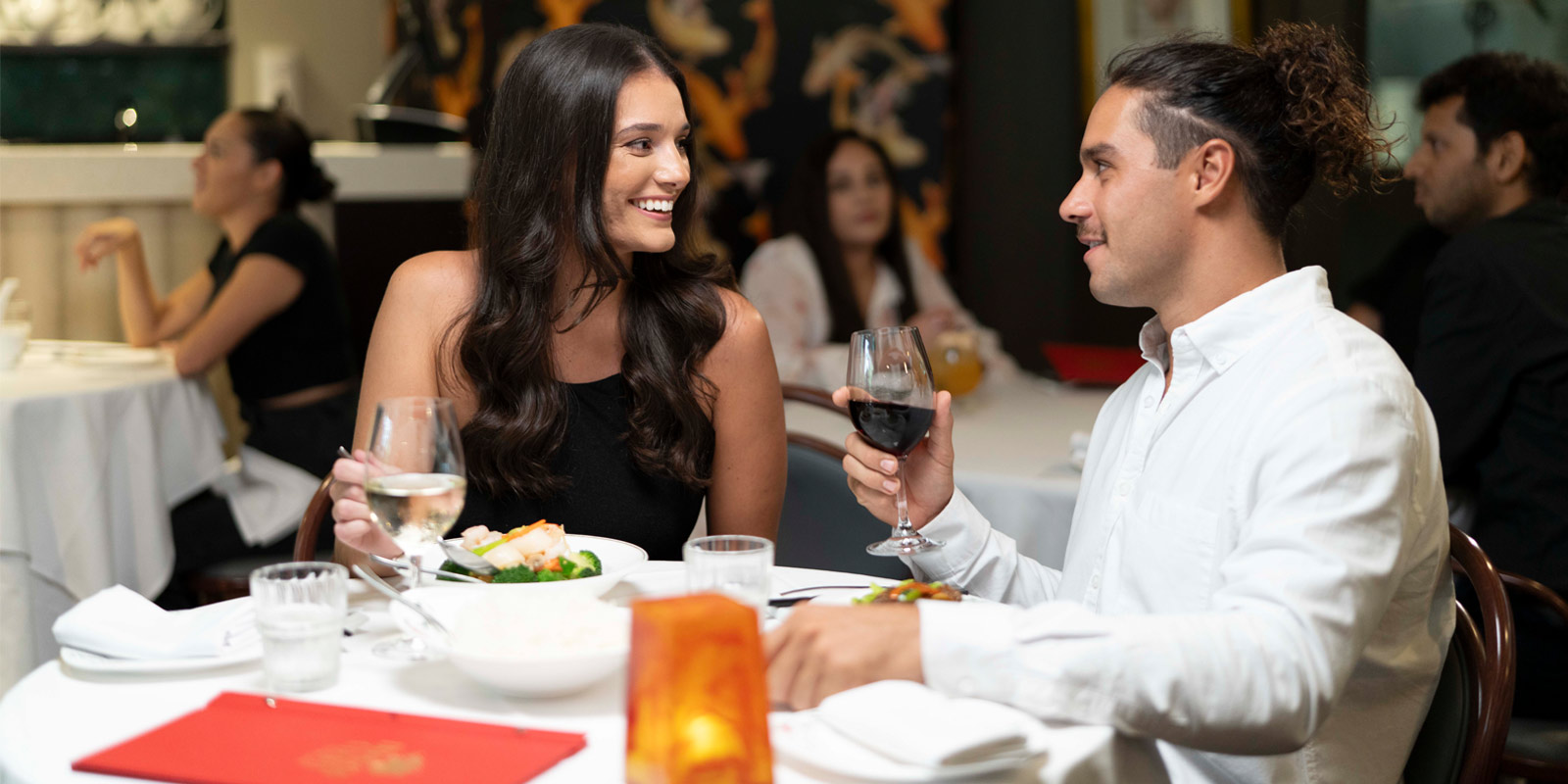 A couple dining at Dragon Court Restaurant