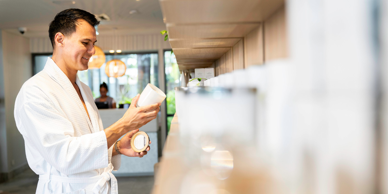 Customer looking at spa care products at Mindil Beach